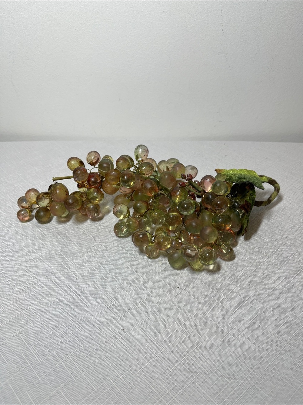 Vintage green pale purple lucite grape cluster. Wire wrapped stem. Realistic!